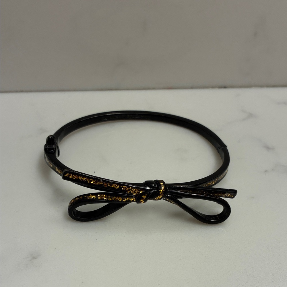 kate spade black and gold bow bangle bracelet